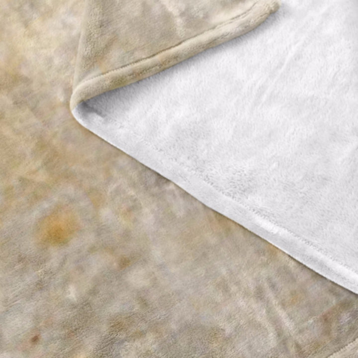 Osoba zawinięta w okrągły koc tortilla